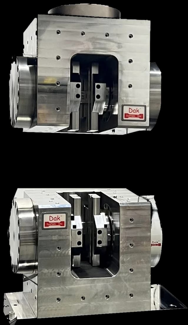 Twin side acting hydraulic grips holding a wide belt specimen