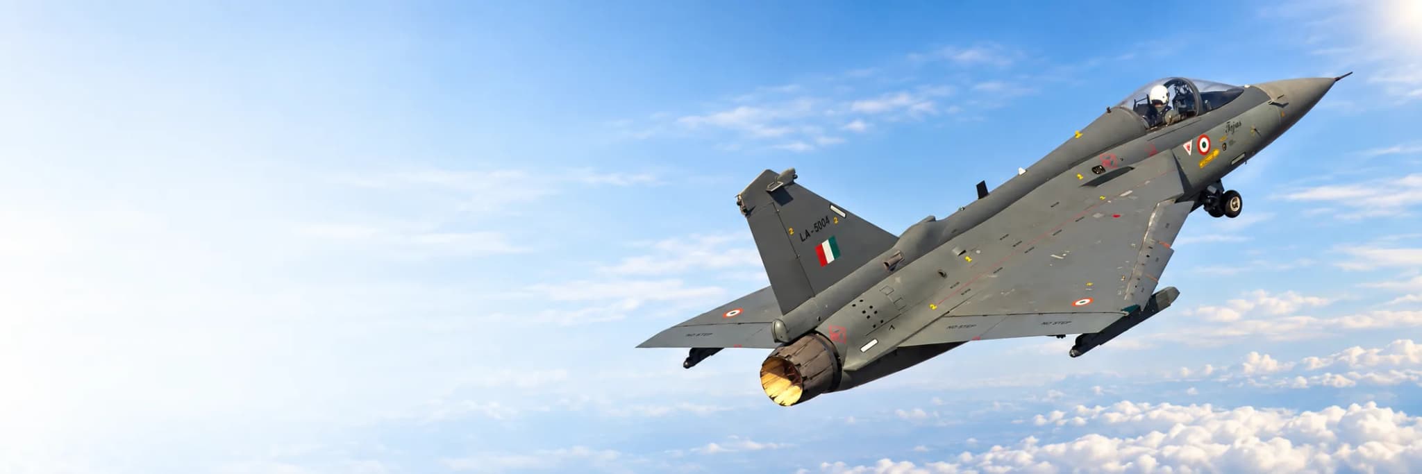 Owner-supplied LCA Tejas aircraft in an edited sky composition